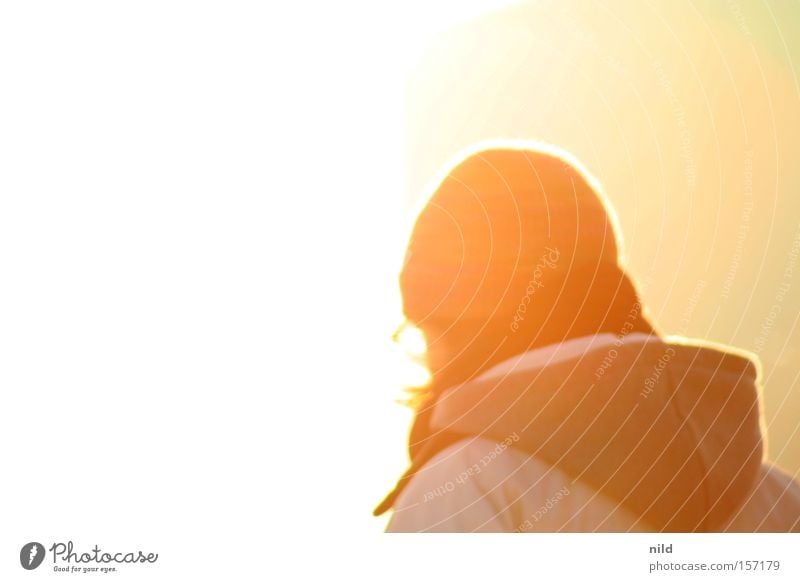 averted Looking away Back-light Sun Bright Hooded (clothing) Cap Dazzle Friendliness Woman Celestial bodies and the universe into the light Lamp