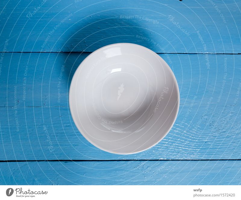 Empty bowl on blue wood in bird's eye view Bowl Restaurant Gastronomy Old Blue White shell Wooden board Wooden table Wooden sign boards Menu menu card Dish map