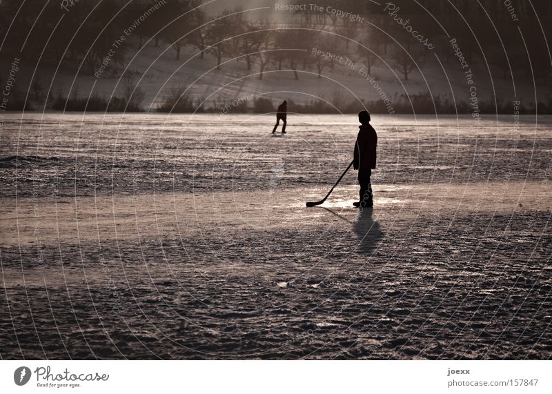 No one plays with me ... Loneliness Ice Frozen surface Ice hockey Ice-skating Field hockey Boy (child) Child Playing Winter Youth (Young adults)
