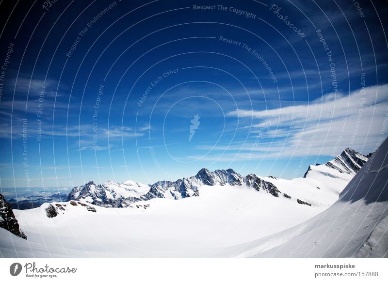 eternal snowfield Peak Mountain Alpine Clouds Cold Bernese Oberland Switzerland Snow virgin yoke Panorama (View) Snowcapped peak Blue sky Beautiful weather