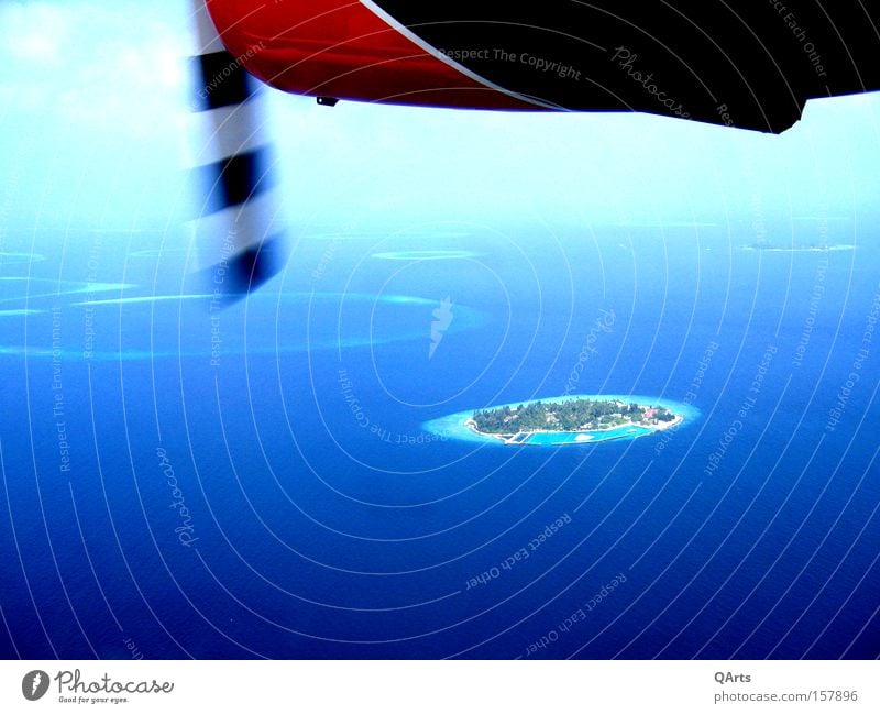 Air Taxi IV Seaplane Maldives Island Ocean Atoll Reef Airplane Vacation & Travel Indian Ocean Exotic Flying Aviation Asia island world Propeller