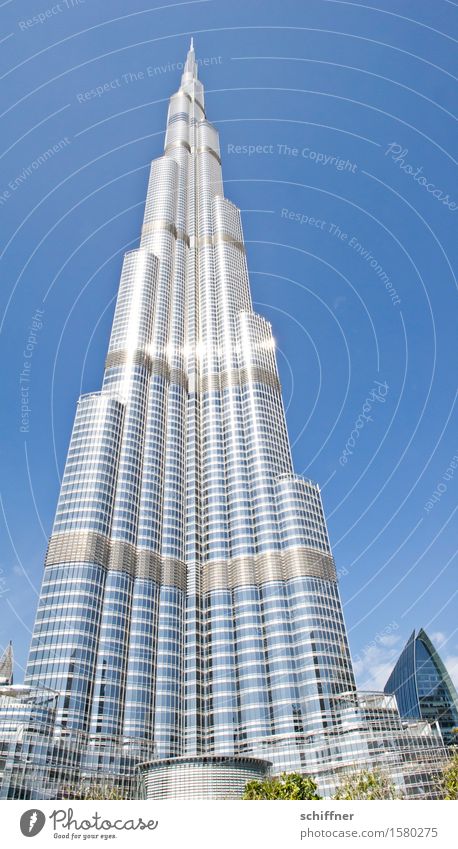 Babel again House (Residential Structure) High-rise Manmade structures Building Architecture Tourist Attraction Landmark Large Tall Blue Silver Burj Khalifa