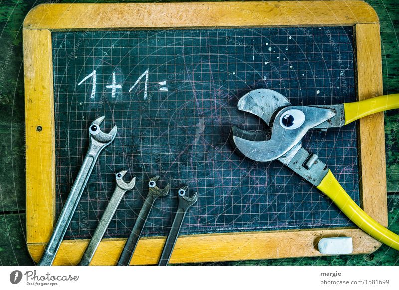 1 + 1 = ? A pair of pliers and four wrenches with eyes on an old calculating board School Blackboard Schoolchild Student Teacher Profession Craftsperson