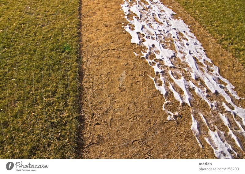 springtime tracks Snow Tracks Lawn Meadow Spring Snow track Deserted Footpath Promenade Central perspective Sandy path Gravel path Footprint