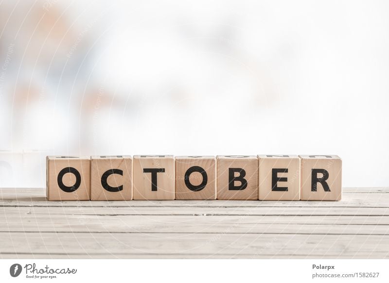 October sign made of wooden cubes Design Playing Reading Art Autumn Toys Wood Signage Warning sign Uniqueness White Colour Text block monthly Word