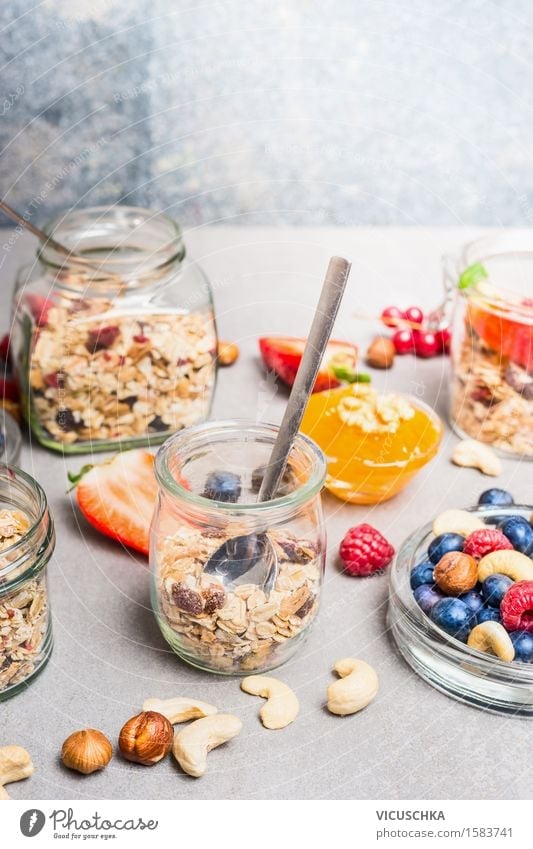 Breakfast in glass with fresh berries, nuts and muesli Food Yoghurt Fruit Grain Dessert Nutrition Buffet Brunch Organic produce Vegetarian diet Diet Glass Spoon