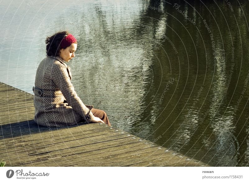 quietude Colour photo Copy Space right Calm Human being Feminine Young woman Youth (Young adults) Woman Adults 1 Lake River Think Relaxation Sit Sadness Gloomy