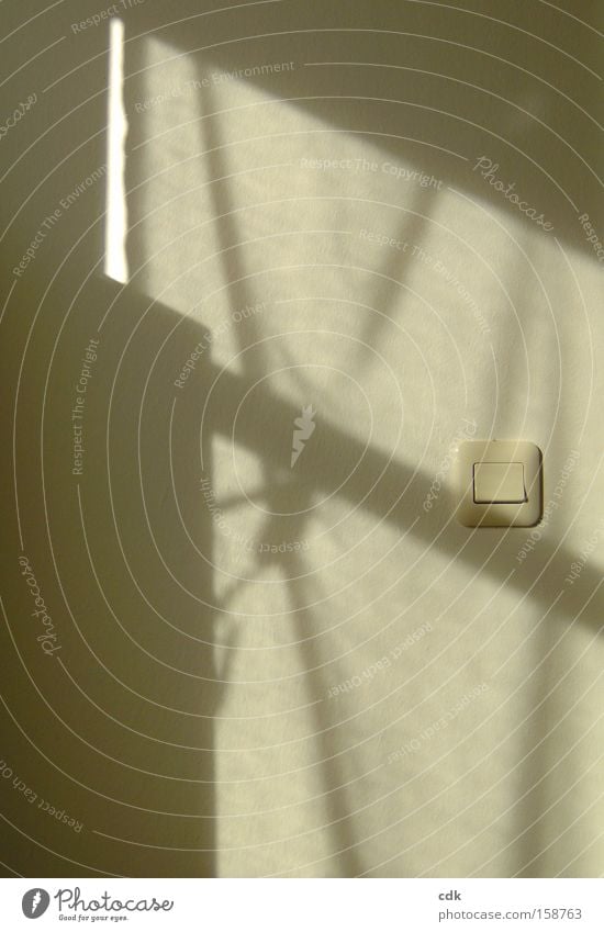 Shadow on the wall | light switch and light sign. Wall (building) Light switch Window Room Image Structures and shapes Light and shadow Sign Cloth Folds Drape