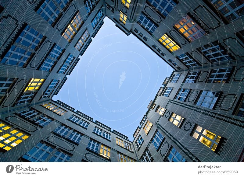 Blue sky and artificial suns of work Work and employment Berlin Backyard Sky Window Worm's-eye view Yellow Overwhelming Architecture Business