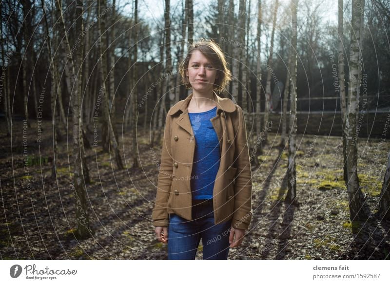 In the birch grove IV Birch tree Forest Clump of trees Girl Young woman Model Back-light Nature Shadow Sun Jacket Coat Blue Streak of light Clothing Spring