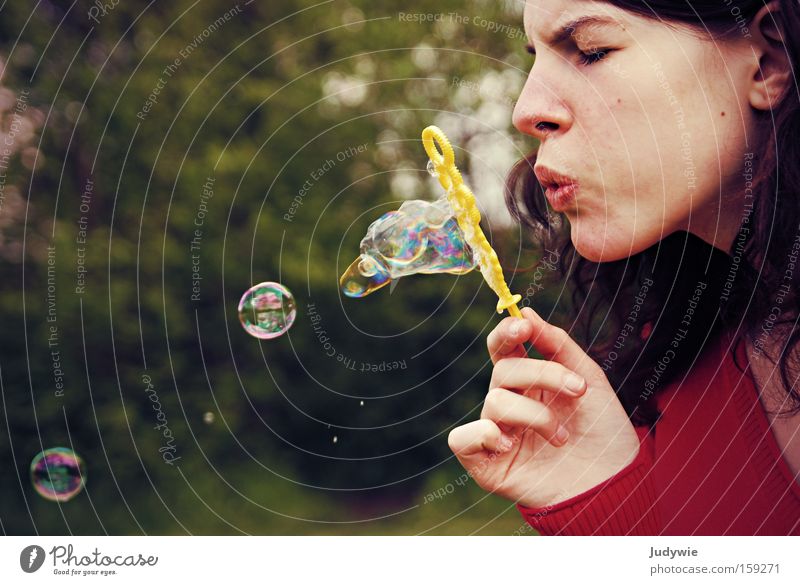 The art of soap blowing Multicoloured Joy Beautiful Playing Summer Woman Adults Youth (Young adults) Nature Happiness Strong Red Power Soap bubble Force Blow