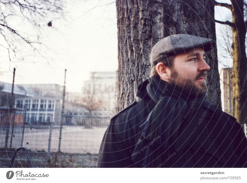 When's the bus coming? Man Human being Winter Cold Jacket Hat Facial hair Stand Lomography Analog Scarf Wait Face of a man Portrait photograph Looking away
