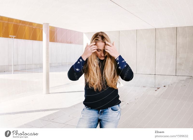 Stylish Girl Model On Wall With Red Sweater A Royalty Free Stock Photo From Photocase