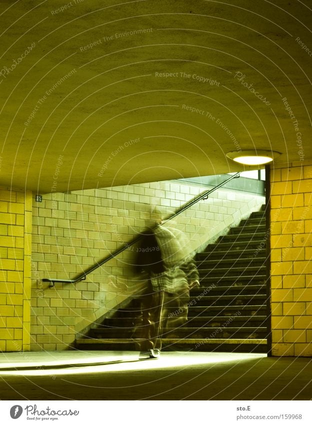 expeditious Tunnel Stairs Handrail Banister Bridge railing Light Lighting Mosaic Movement Spree Train station Architecture Stress Haste Traffic infrastructure