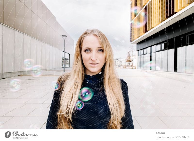 Young woman with soap bubbles Human being Feminine Youth (Young adults) 1 18 - 30 years Adults Building Wall (barrier) Wall (building) Sweater Piercing Blonde