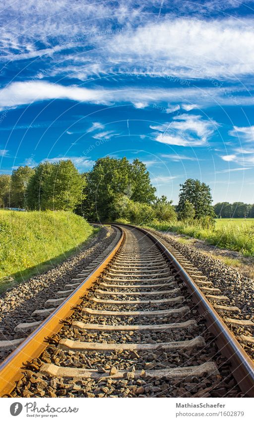 colored rails Environment Nature Landscape Sky Clouds Summer Beautiful weather Grass Field Village Deserted Traffic infrastructure Public transit Logistics