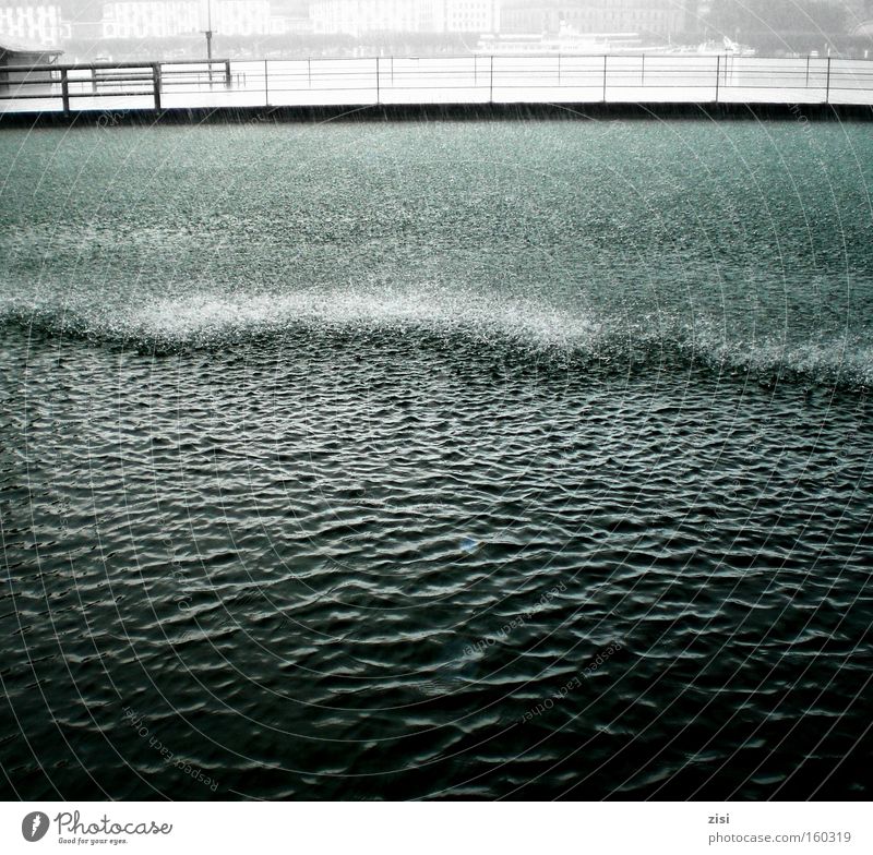 Rain washes Lucerne clean Water Lakeside Deserted Dark Lake Lucerne Colour photo Subdued colour Exterior shot Bridge Surface of water Copy Space bottom Curls