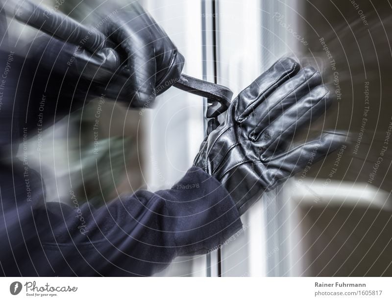 A burglar pokes up a window. Human being Arm 1 Aggression Threat Might Fear Dangerous Destruction "Burglary burglars delinquent felonies Force law crowbar