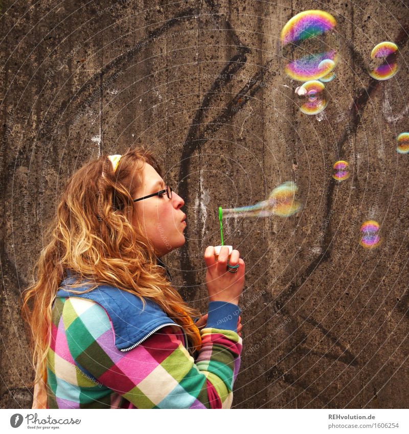 Young woman blows soap bubbles Human being Feminine Youth (Young adults) 1 18 - 30 years Adults Sweater Blonde Curl Playing Joy Happy Happiness Contentment