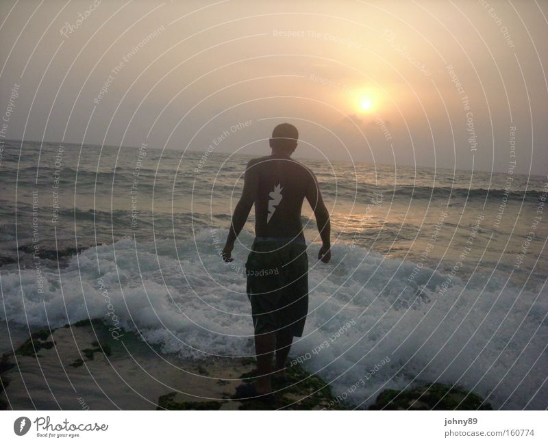 Man against sea Ocean Musculature Lake Surf Cool (slang) Sweet Sun Sunset Mediterranean sea Boredom Grief Distress Fight dusky