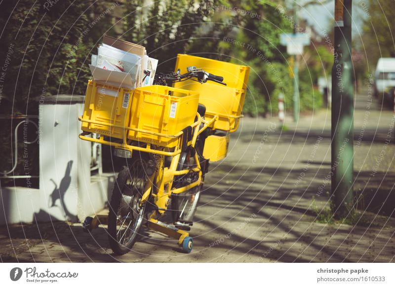 If the postman has twice ... Logistics Mail Town Cycling Yellow Bicycle Postman Sidewalk Delivery Mail order selling Letter (Mail) Colour photo Exterior shot