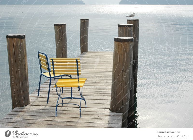 have a seat Autumn Chair Calm Water Mountain Alps Swiss Alps Light Shadow Switzerland Lake Loneliness Yellow Blue Gray