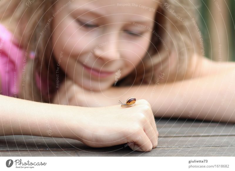 new girlfriend | Smiling girl with little snail on her hand Feminine Child Girl Infancy 1 Human being 3 - 8 years 8 - 13 years Environment Nature Animal Summer
