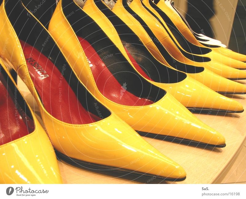 post fashion Yellow High heels Footwear Goods Trade Shelves Shoe shop Clothing Landing Tall pointy Fashion