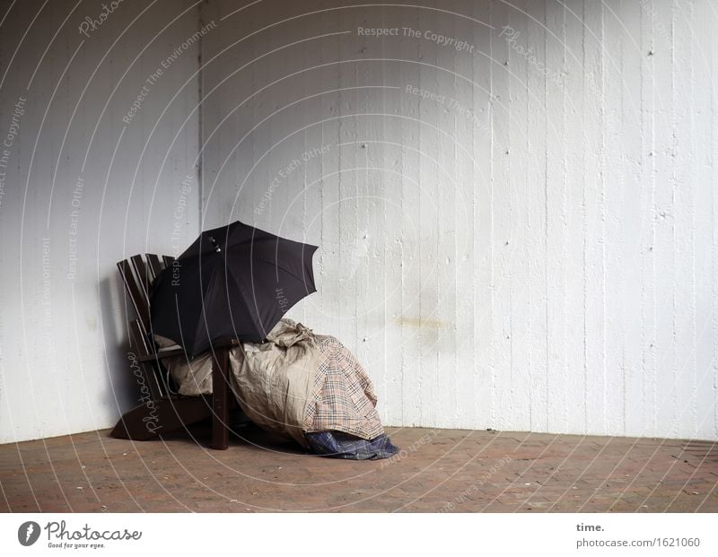Charity | respecting zone Chair Blanket Wall (barrier) Wall (building) Umbrella Trashy Gloomy Dry Under Safety Protection Truth Fatigue Disappointment