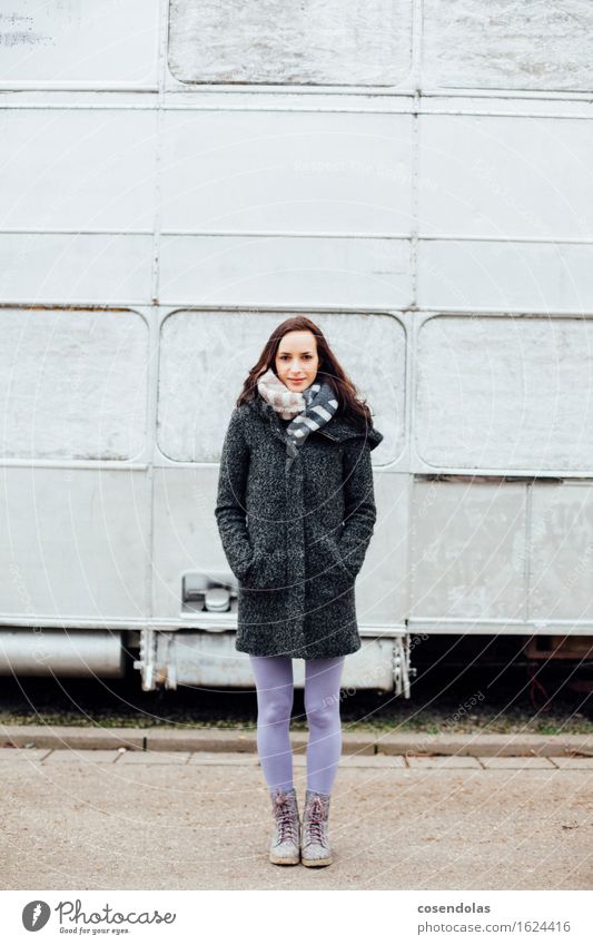 Young woman stands in front of a silver bus University & College student Feminine Youth (Young adults) 1 Human being 18 - 30 years Adults Jacket Coat Boots