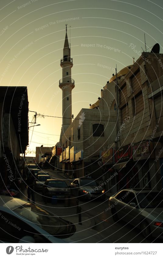 Urban traffic in the Middle East Small Town Populated House (Residential Structure) Tower Manmade structures Building Architecture Street Driving Minaret Mosque
