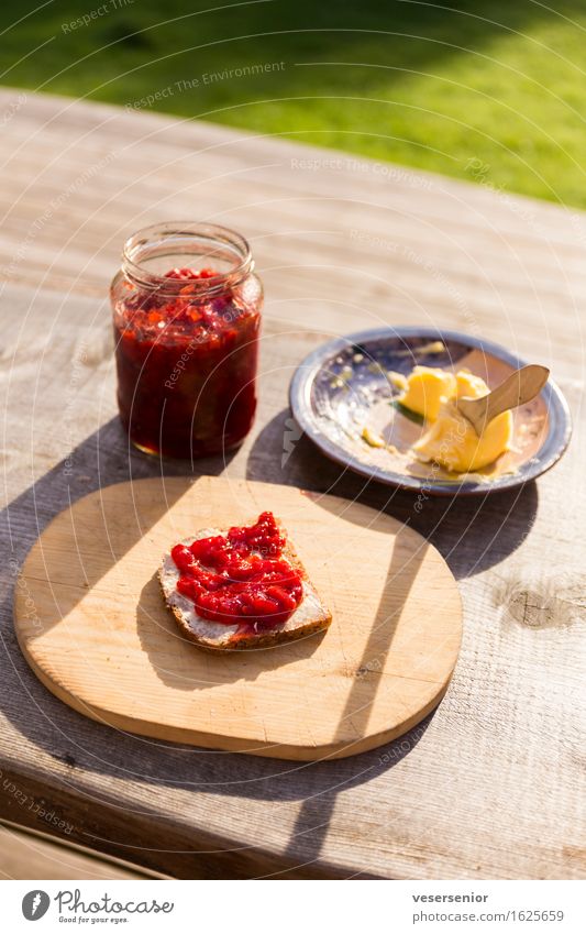 Swedish summer fueh in the morning Bread Jam Butter Breakfast Chopping board Eating To enjoy Simple Delicious Sweet Anticipation Modest Idyll Calm Thrifty