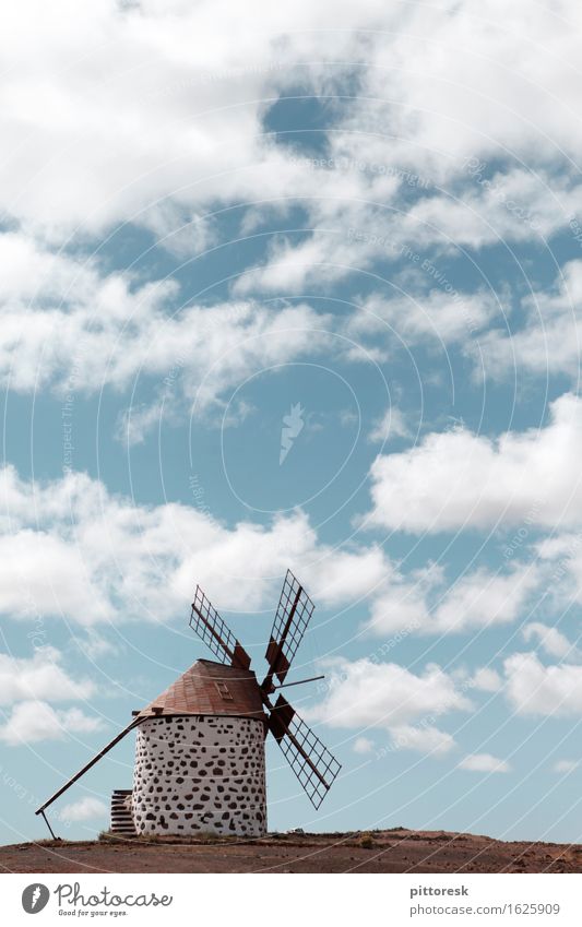 Wind VI Art Work of art Esthetic Calm Pinwheel Windmill Spain Wind energy plant Clouds Summer Summer vacation Remote Historic Tourist Attraction Colour photo