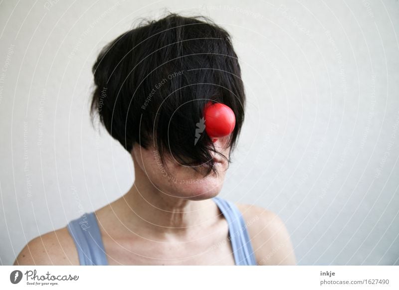 Woman with clown nose and hair in front of her face Lifestyle Style Joy Clown Adults Head Hair and hairstyles Face 1 Human being Black-haired Short-haired