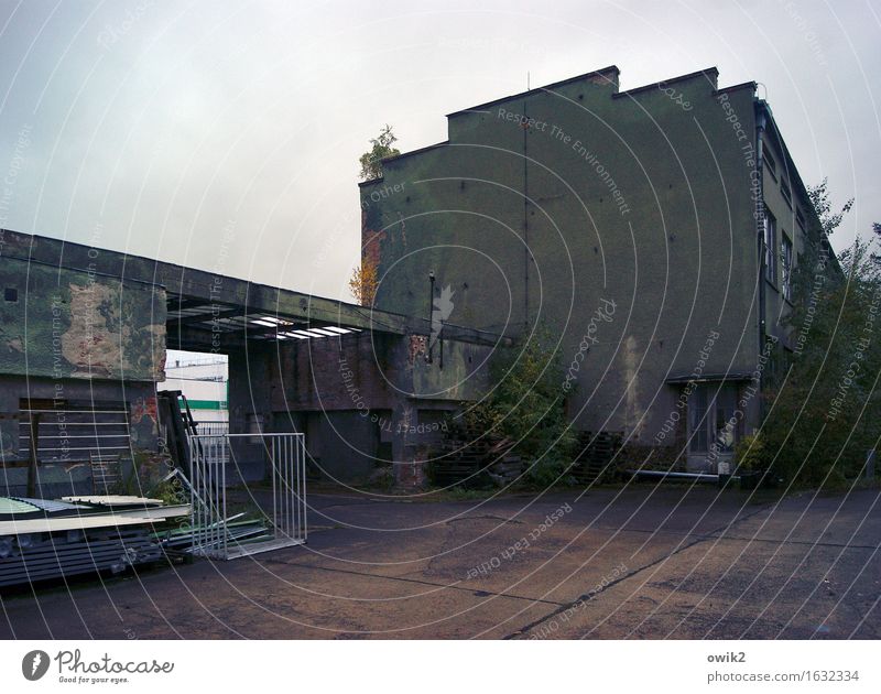 Hat factory Luckenwalde Clouds Bushes Brandenburg Germany House (Residential Structure) Industrial plant Factory Manmade structures Building Wall (barrier)