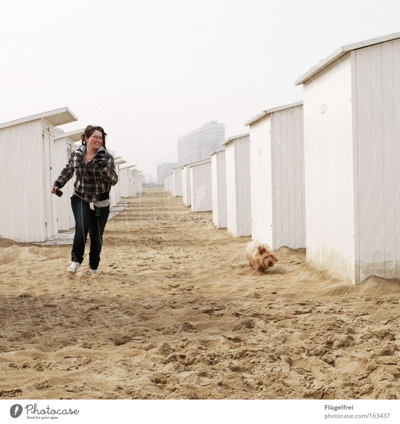 on the straight Joy Happy Freedom Beach Ocean Human being Youth (Young adults) 1 Nature Sand Sky Coast North Sea House (Residential Structure) beach houses Pet