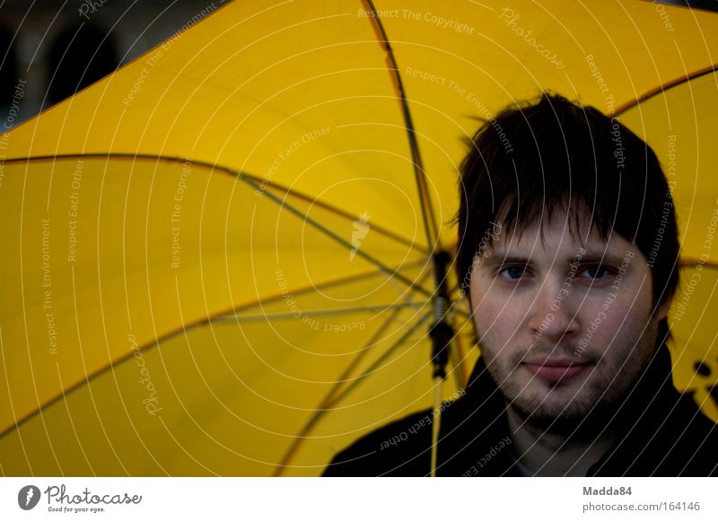 Under the umbrella Colour photo Exterior shot Copy Space left Day Shallow depth of field Portrait photograph Looking into the camera Human being Masculine Man