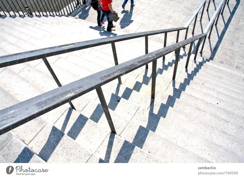 staircase Stairs Stage Level Ascending Descent Go up Steps Handrail Banister Sun Shadow Summer Career Crazy Upward Downward Landing Legs Footwear Visitor Tilt