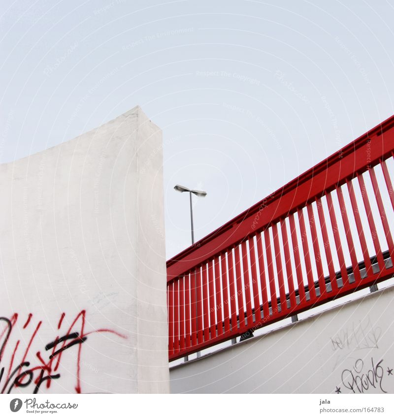 red rail Colour photo Exterior shot Deserted Day Light Cloudless sky Bridge Manmade structures Wall (barrier) Wall (building) Street lighting Handrail Blue Red