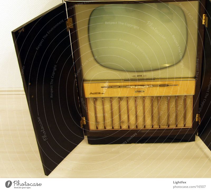 Watch TV! TV set The fifties Sixties Cuba Ancient Television Wood Wood flour Human being Shows Media Old Technology Net