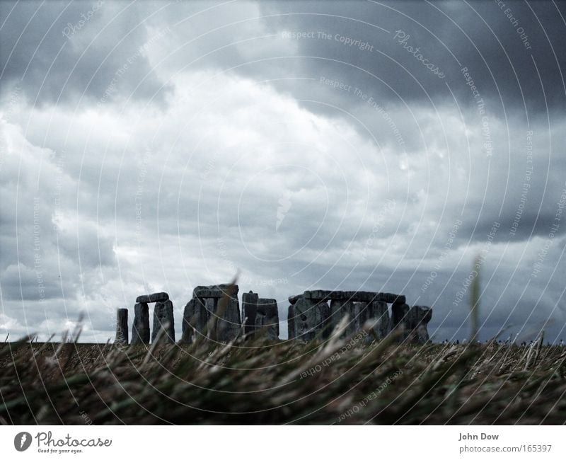 Stonehenge II Colour photo Subdued colour Exterior shot Deserted Work of art Storm Wind Gale England Tourist Attraction Landmark Monument Old Threat Famousness