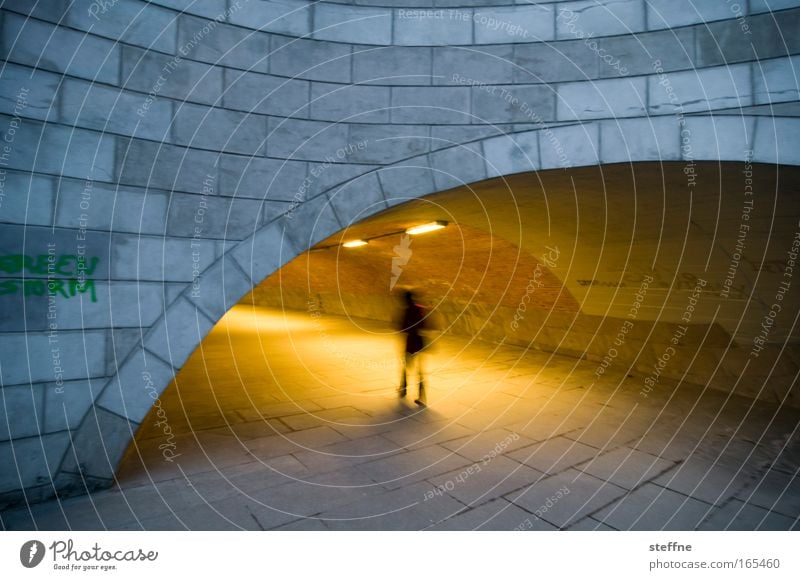 GREEN STORM Subdued colour Exterior shot Twilight Silhouette Blur Motion blur Human being 1 Bridge Tunnel Underpass Pedestrian underpass Fear Dark Mysterious