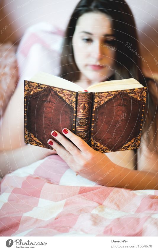 young woman reads book in bed Book Reading Woman Young woman girl Study Novel thrilling Bookworm Shackled Bed Duvet Cozy concentrated hobby stay at home