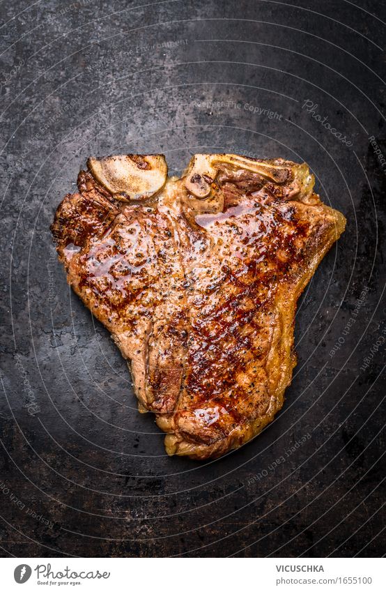 Roasted or grilled T-bone steak Food Meat Nutrition Lunch Buffet Brunch Banquet Organic produce Style Barbecue (apparatus) Steak t-bone Rustic BBQ Steakhouse