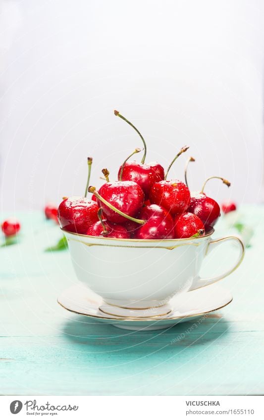 cup with sweet cherries on light background Food Fruit Dessert Nutrition Breakfast Organic produce Vegetarian diet Diet Cup Style Healthy Eating Life Summer
