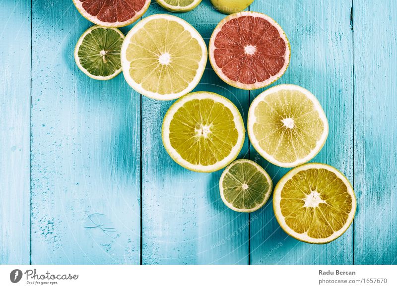 Lime, Lemons, Oranges And Grapefruit Fruits On Turquoise Table Food Nutrition Eating Organic produce Vegetarian diet Diet Healthy Healthy Eating Fitness To feed