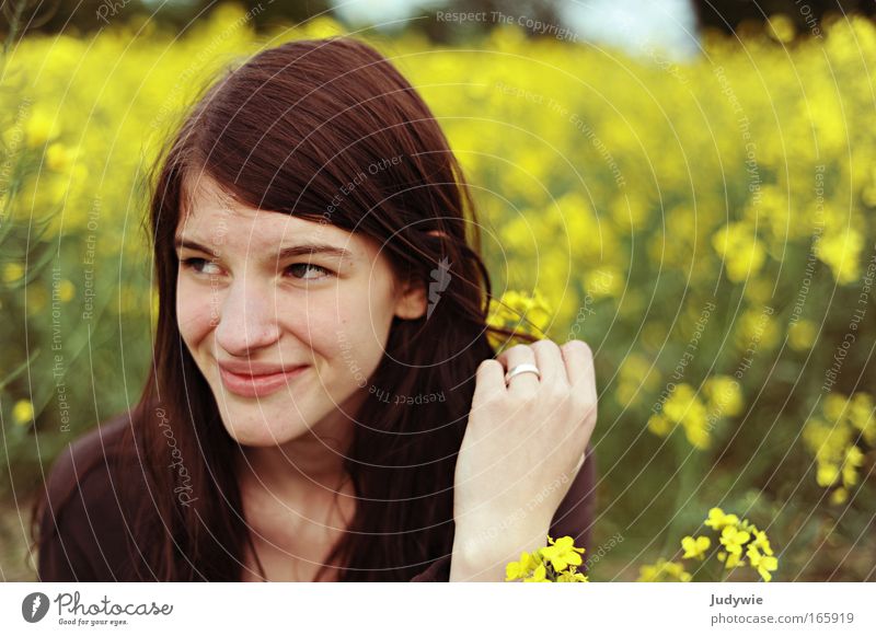 Rapsrike. Colour photo Exterior shot Copy Space right Day Shallow depth of field Portrait photograph Looking away Joy Happy Hair and hairstyles Human being