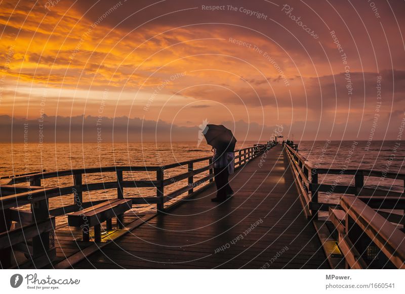 On the pier Beautiful weather Bad weather Wind Baltic Sea Footbridge Dusk Glow Waves Ocean Coast wood Red Calm Relaxation Vantage point Vacation & Travel Card