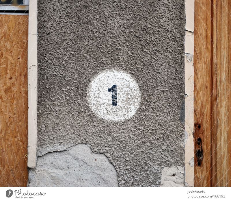 ONE in a circle Wall (building) Wood Sign Signs and labeling 1 Simple Gray White Orderliness Surface Circle Weathered Fracture point Plaster Center point