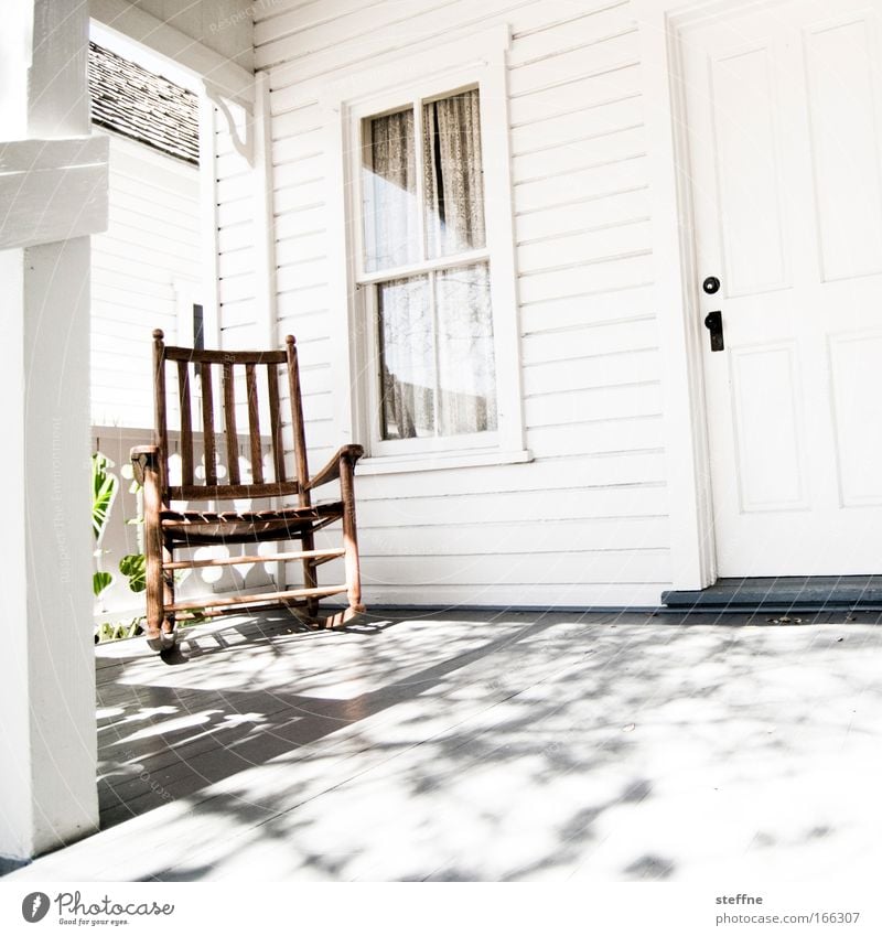 Rocking chair for old men Colour photo Exterior shot Day Light Shadow Contrast Wide angle Village Fishing village Small Town Outskirts